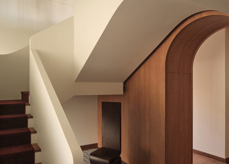Residential architecture by Alexandra Buchanan Architecture integrated into landscape with controlled light and refined material detailing